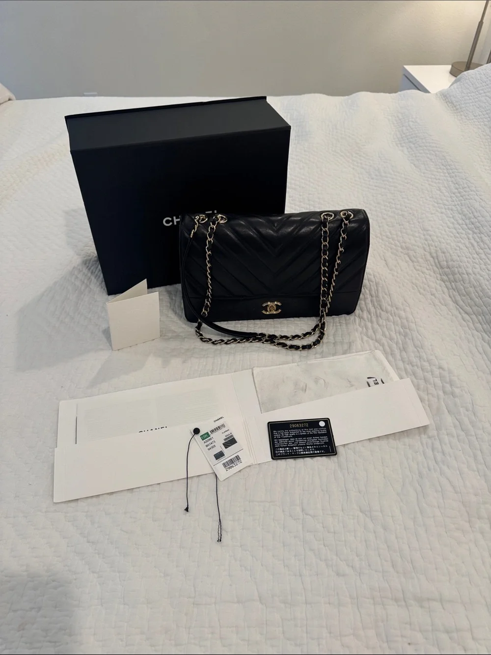 CHANEL Black Chevron Quilted Shoulder Bag with Gold Chain